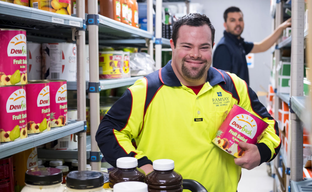 Christopher proudly working at Joondalup Health Campus