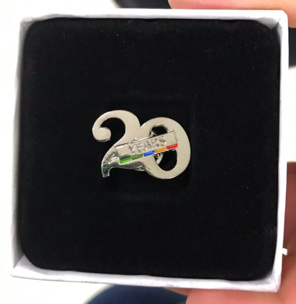 Image of Matty's 20 year silver service pin in its box.